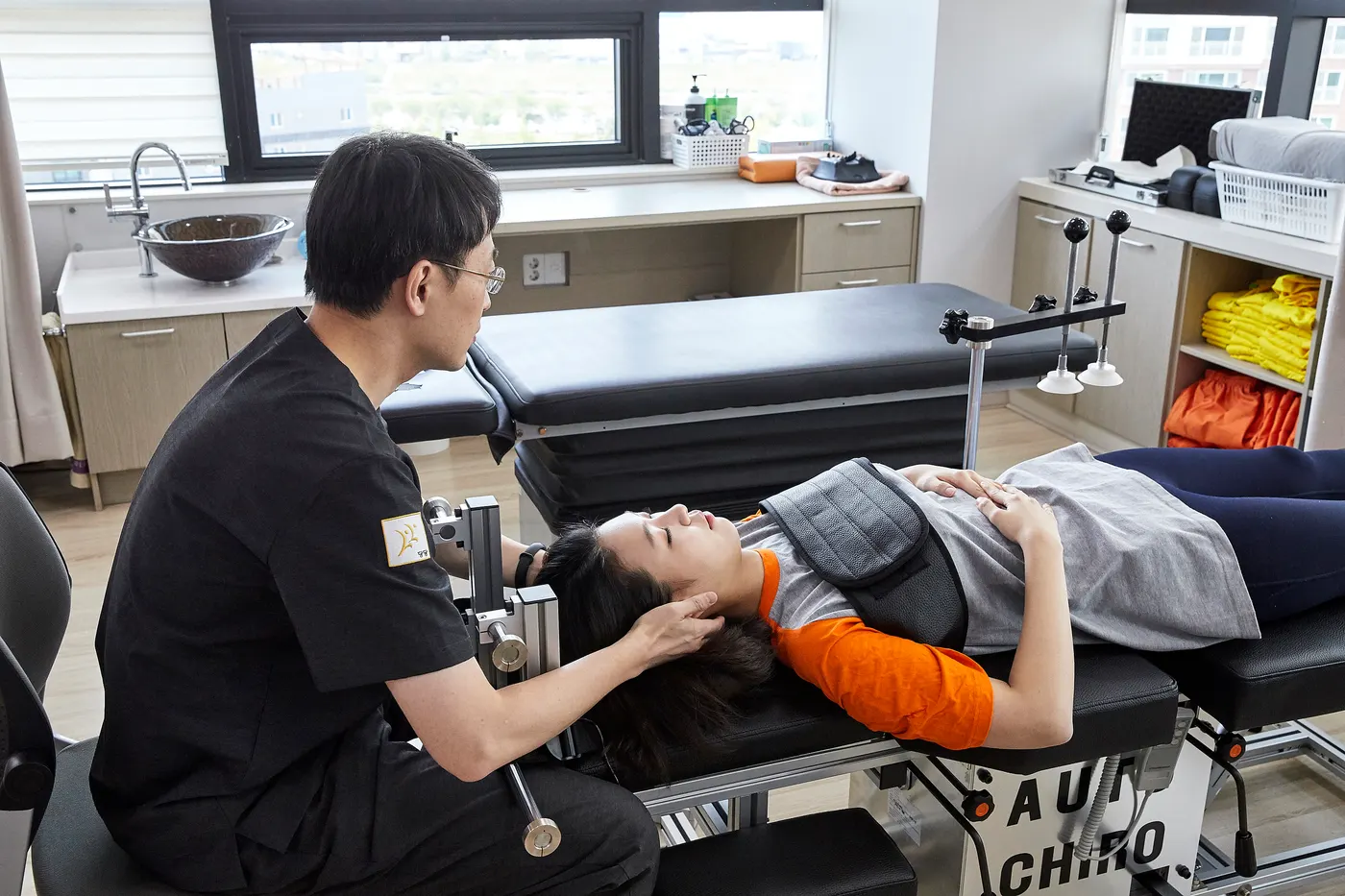 Corrective treatment working on the alignment of the neck and head